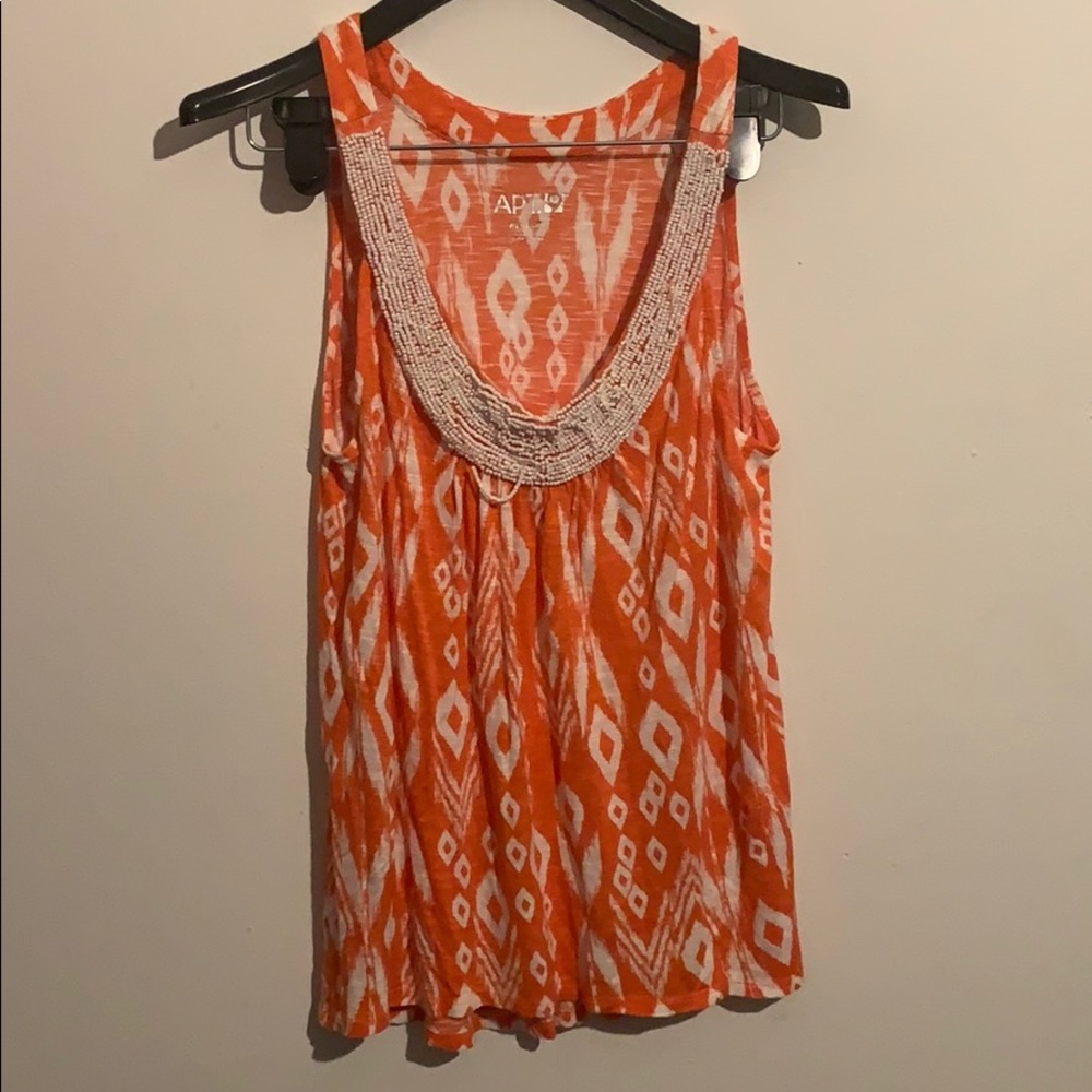 Damaged orange and white apt 9 tank top